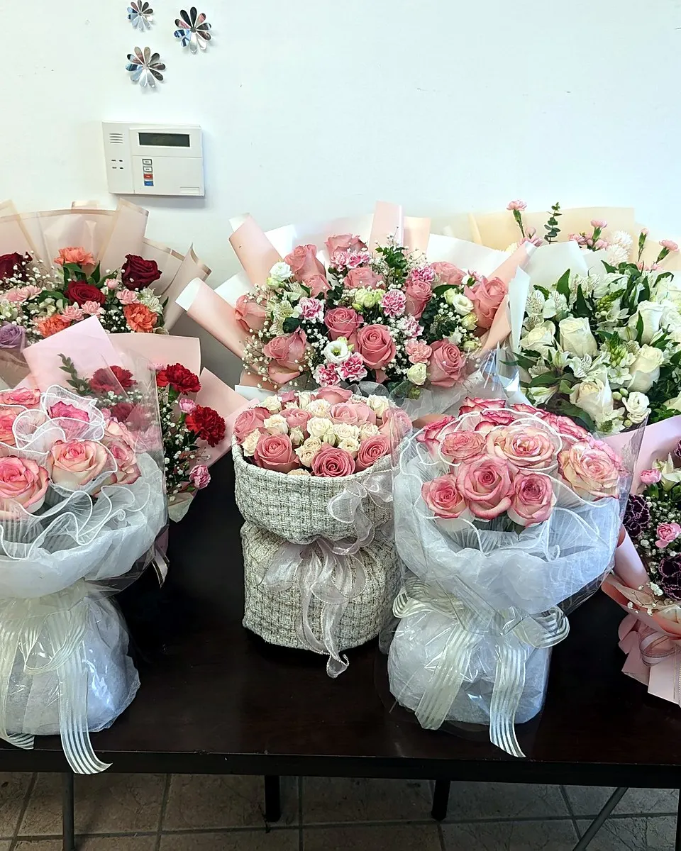 Collection of blush pink and white rose bouquets